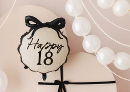 Balon foliowy Happy ''18'' z kokardką, osiemnastka, czarno- beżowy, 47,5x45 cm Partydeco